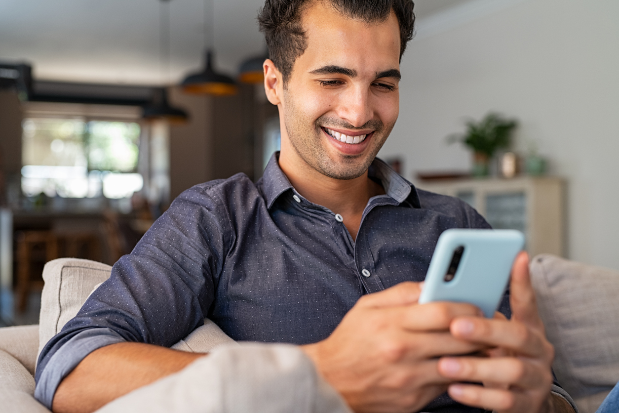 Man reading information about mental health on his phone