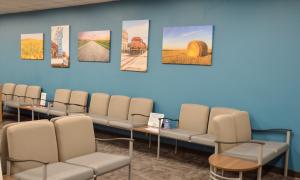 Chairs and colorful artwork in the Fargo lobby