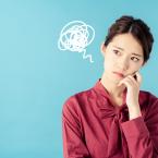 Girl thinking about future with worrisome scribble near her head